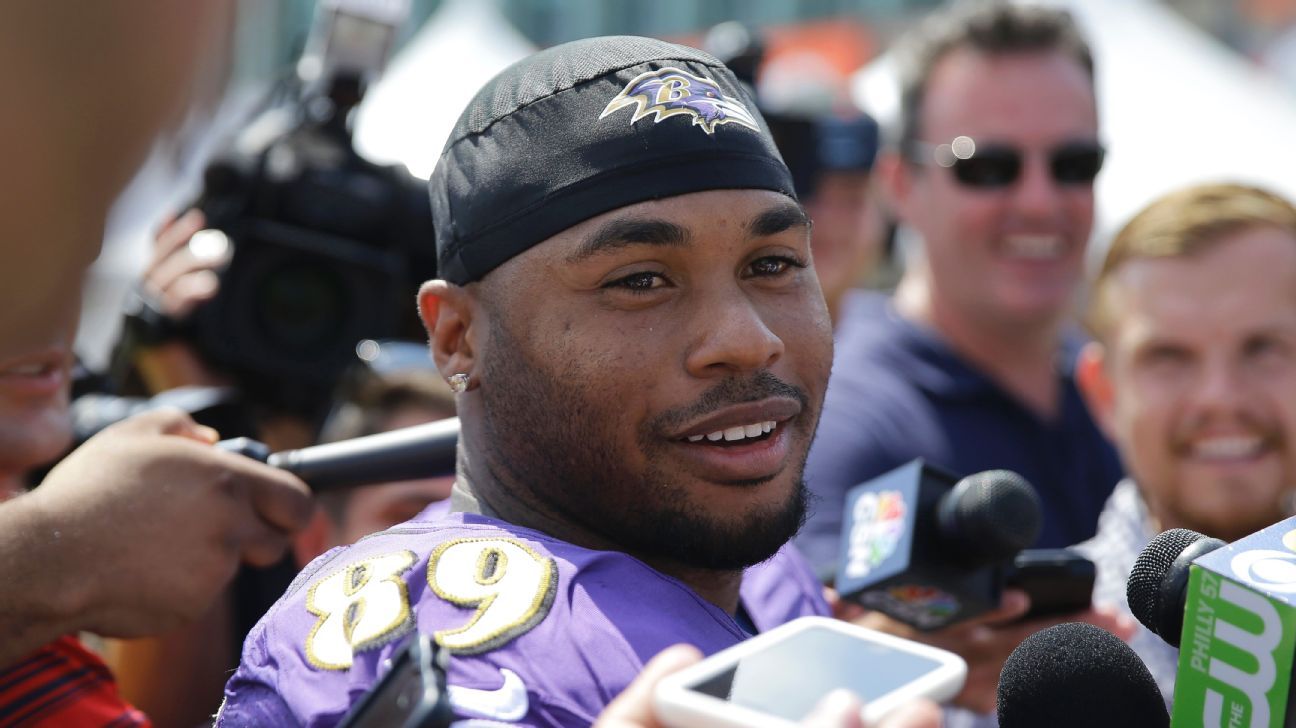 Young camper says 'Go Patriots!' at Steve Smith's football camp