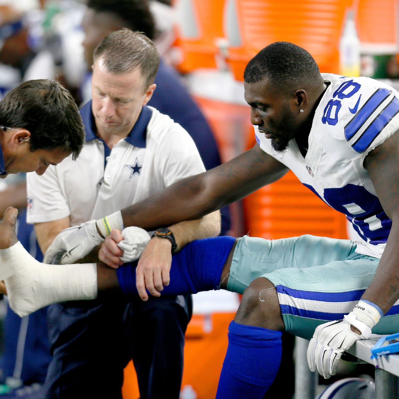 Bryant rehabs on field during Cowboys practice