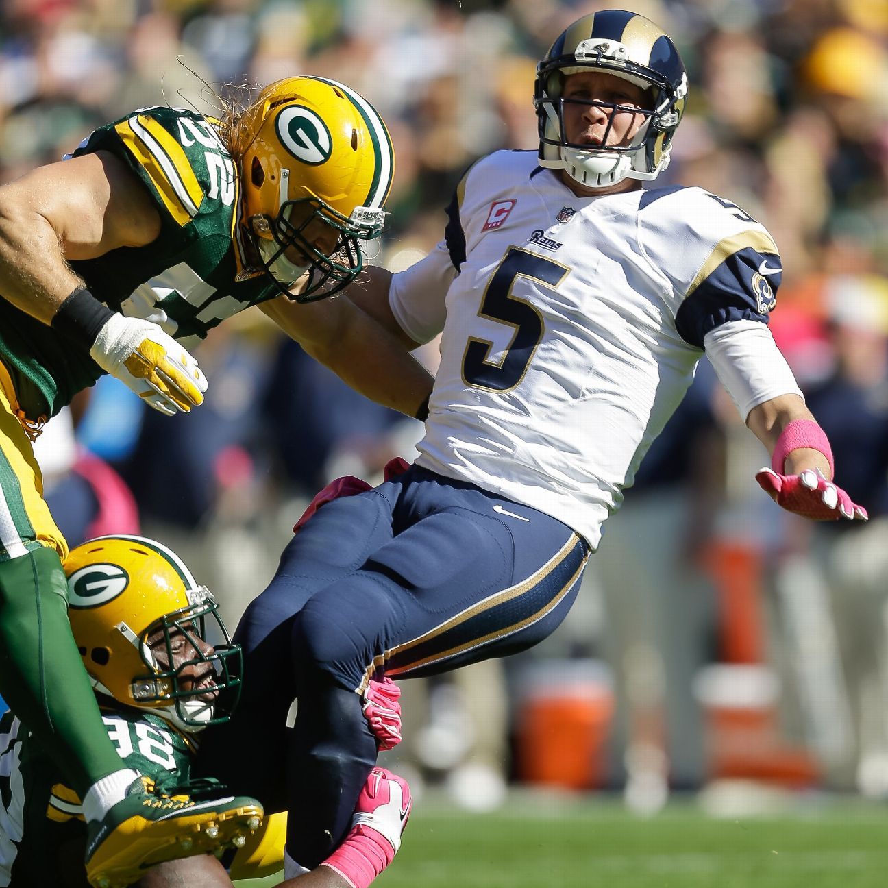 Packers rely on their defense to beat Rams