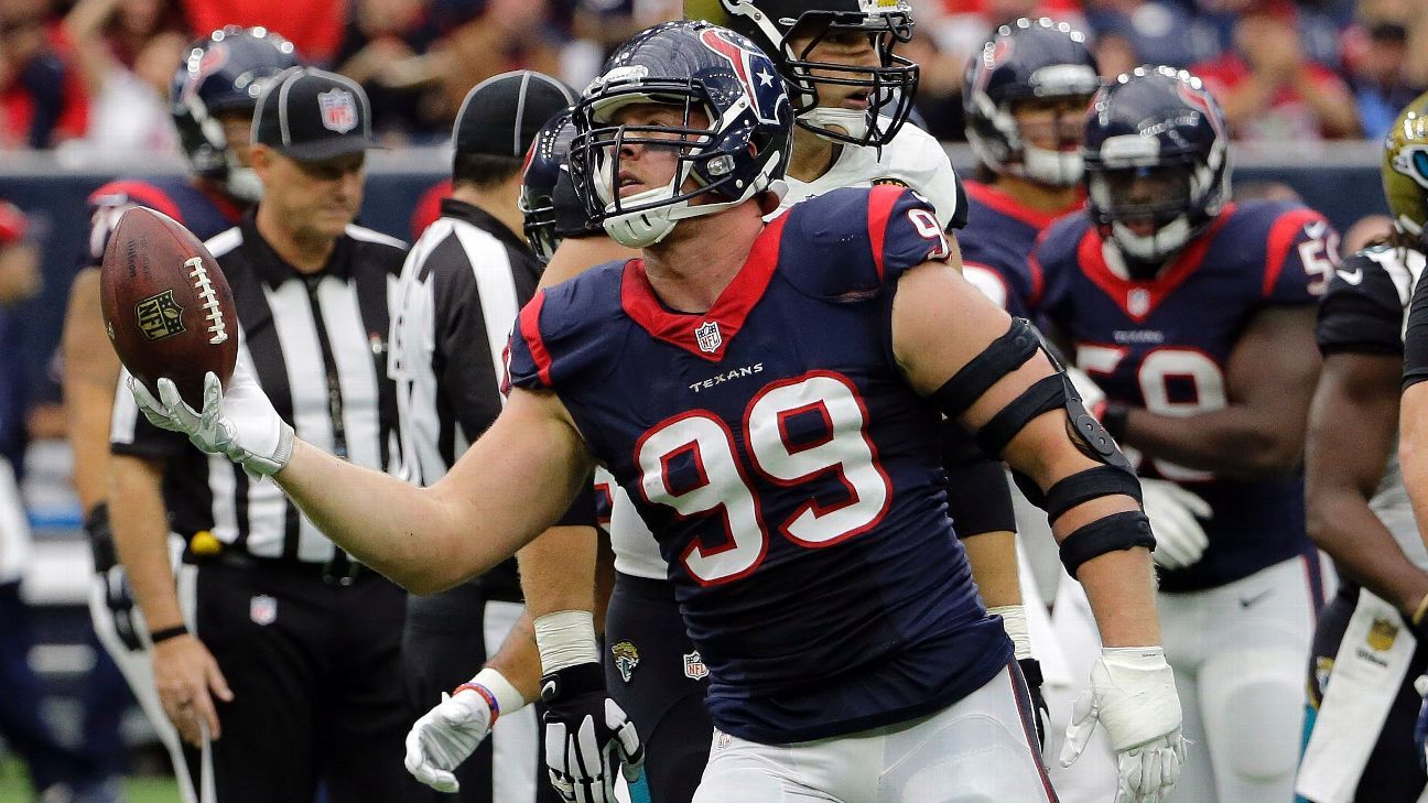 J.J. Watt has a margarita with Jimmy Buffett, flexes with 2 Chainz