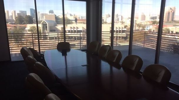 An innocuous conference room table at UNLV was the setting for an all-important meeting in February 2015 with the Raiders.