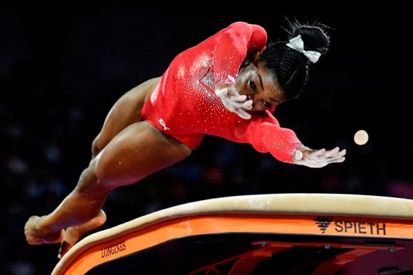 Simone Biles won gold in the vault Saturday, giving her 23 career world championship medals to tie the record for most world medals, male or female.