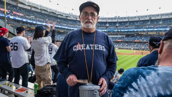 New York Yankees fans bring inflatable trash cans, costumes and