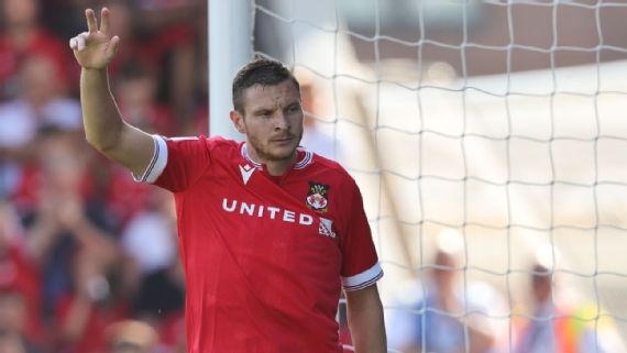 Paul Mullin celebrating a goal for Wrexham