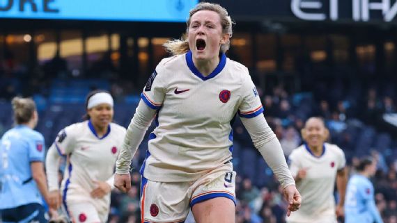 Erin Kutbert celebrates her late winner for Chelsea.