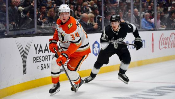 Pavel Mintyukov playing hockey