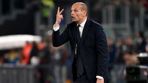 Massimiliano Allegri⁢ smiles during a press conference.