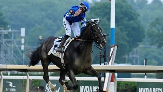 Jockey Junior Alvarado celebrates aboard⁢ Sovereignty after winning the 157th Belmont Stakes.