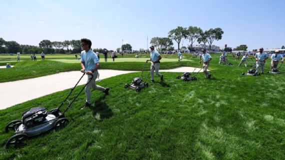 Grounds crew mowing rough at Oakmont
