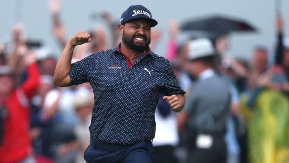J.J. Spaun reacting after making a putt