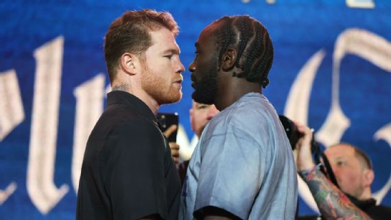 Canelo Alvarez wearing sunglasses at a press event