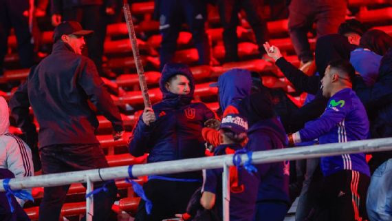 Fans Clash in the stands During ‍the South American Cup Match Between‌ Independiente and Universidad de Chile.
