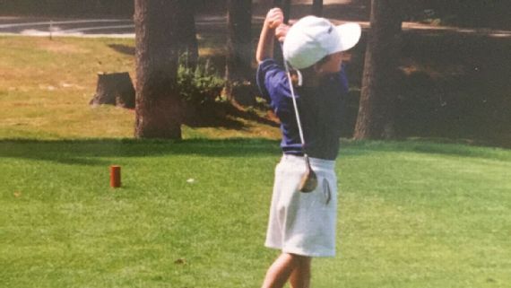 Young Keegan Bradley with golf clubs