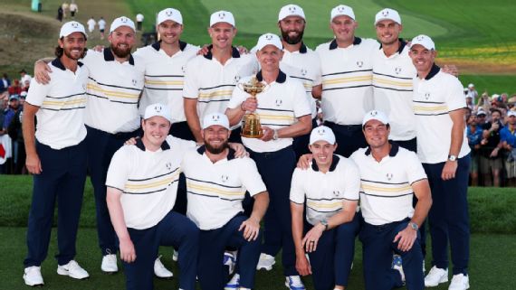Team Europe posing with the Ryder Cup.