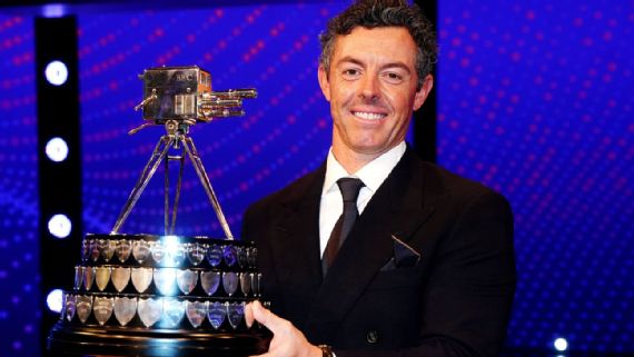Rory McIlroy holding the BBC Sports Personality of the Year award
