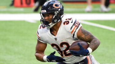 Ledarius Mack, David Montgomery, and Eddie Jackson of the Chicago News  Photo - Getty Images