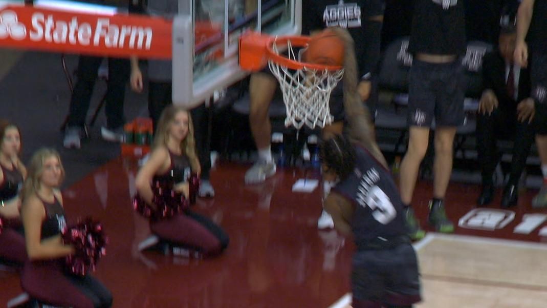 Quenton Jackson rocks the rim with windmill slam ESPN Video