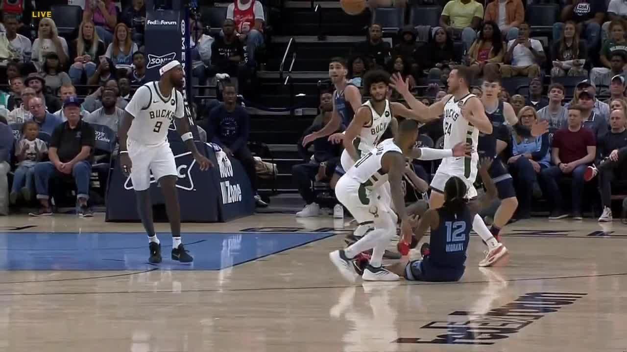 Ja Morant throws up alleyoop … while sitting down ESPN Video