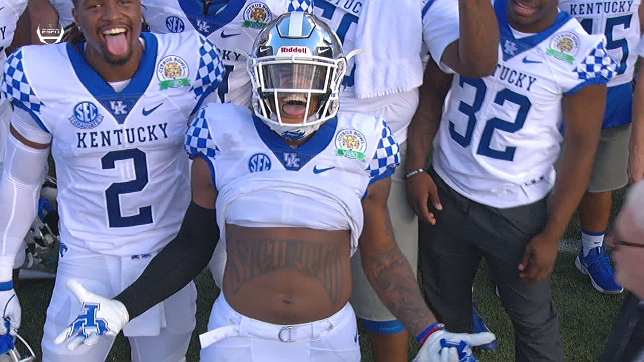 Kentucky running back Benjamin Snell Jr. runs the ball past New Mexico  State defensive back Jaden Wright in the first half of an NCAA college  football game against New Mexico State Saturday