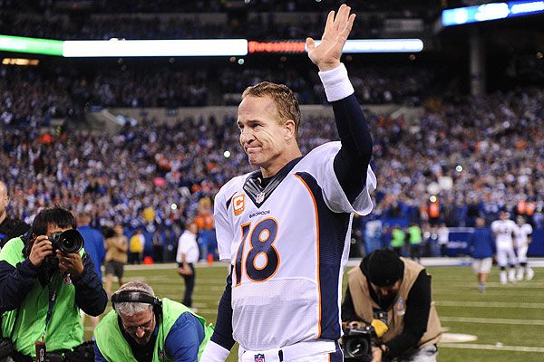 Jeff Fisher wearing colts Peyton Manning Jersey 