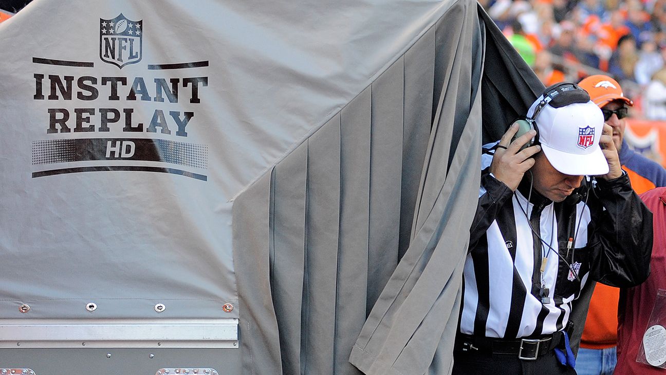 A Microsoft Surface is used for instant replays, on the sideline of an NFL  football game