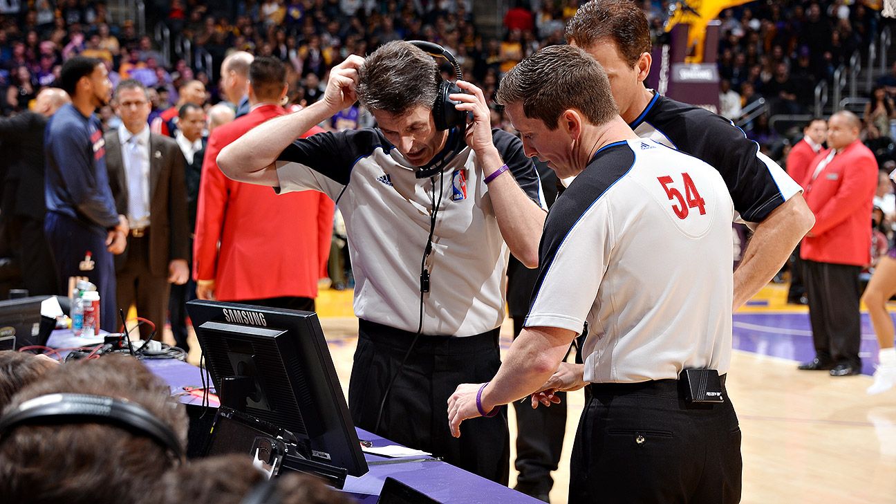 Referee Scott Foster makes a call during the second half of an NBA