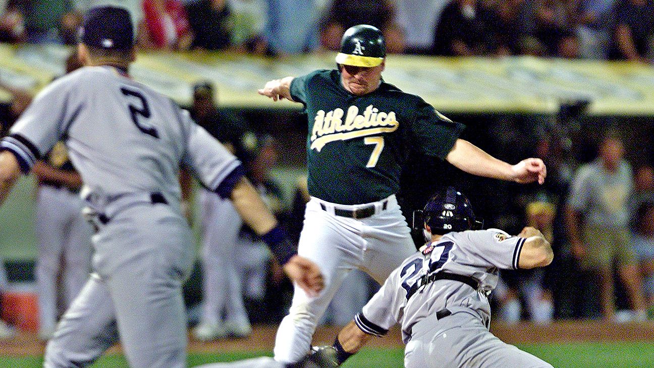 Team USA shortstop Derek Jeter throws to first base in third