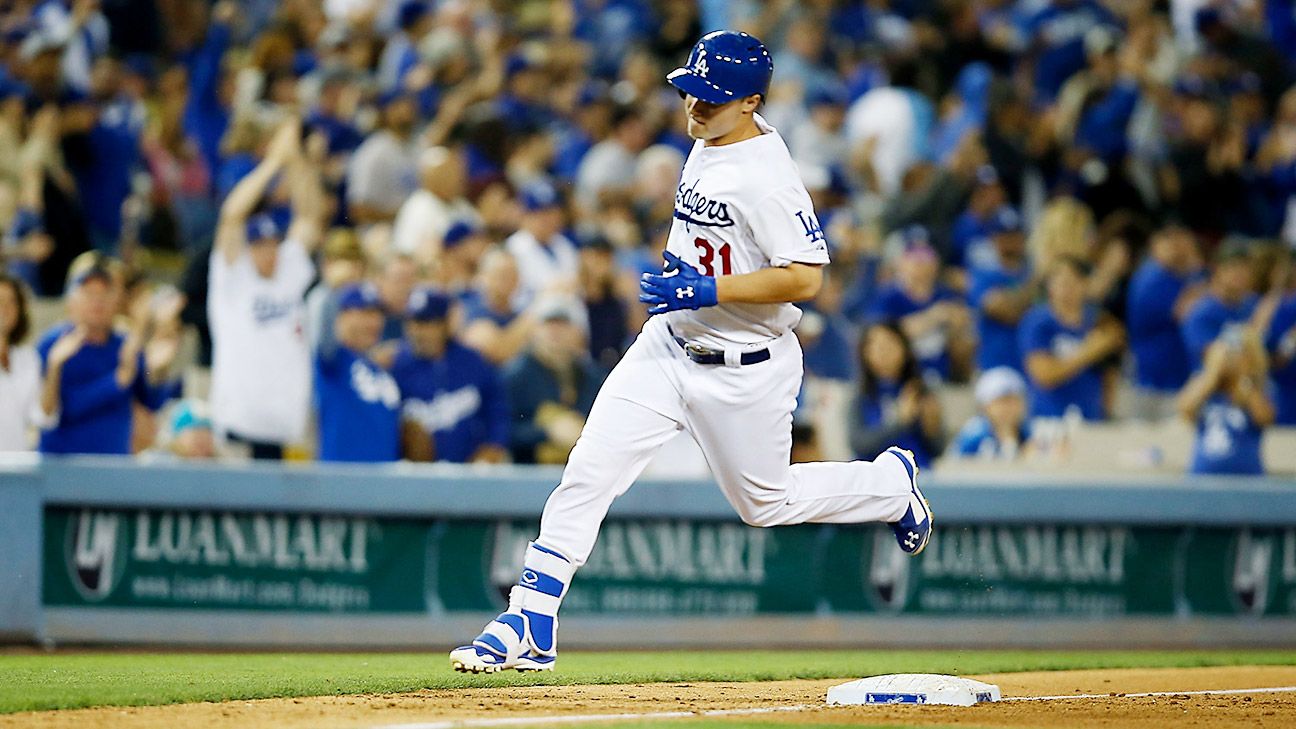 Los Angeles Dodgers left fielder Joc Pederson (31) swings at the