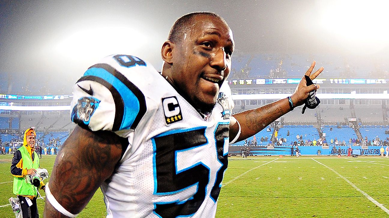 Carolina Panthers linebacker Thomas Davis lifts the NFC