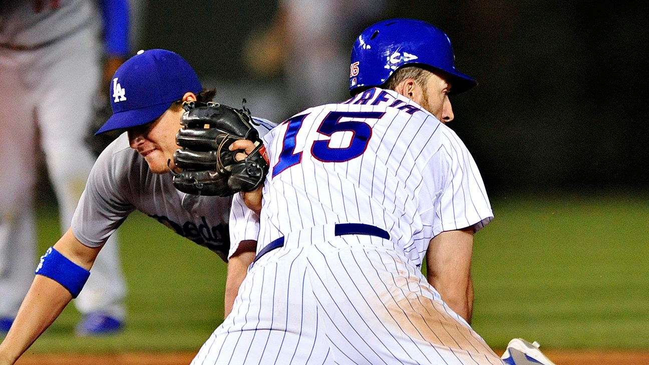 Cincinnati Reds outfielder Chris Denorfia shows the back of the