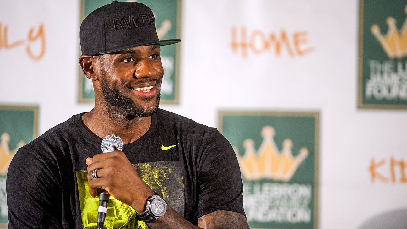 Students of Akron's I Promise School present LeBron James with his NBA  championship ring (video)