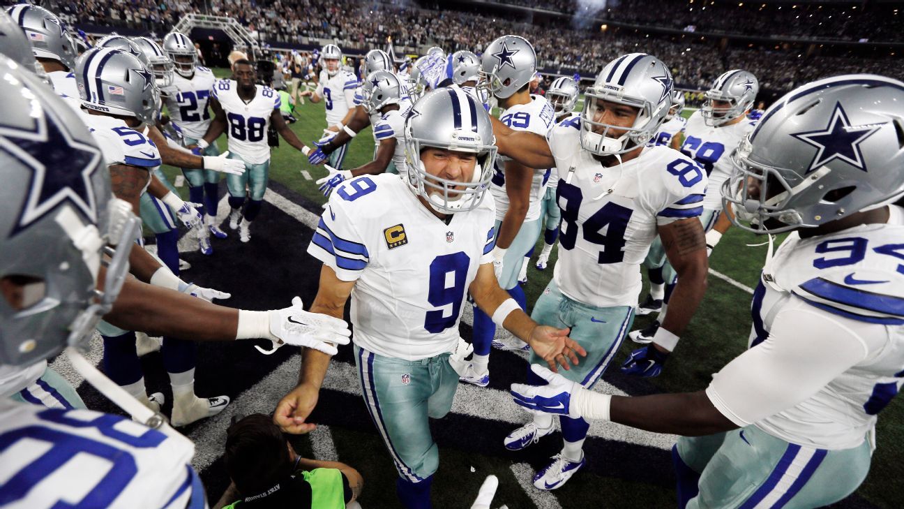 Dallas Cowboys quarterback Tony Romo (9) runs out of the pocket looking to  pass against the New York Giants in the fourth quarter in week 1 of the NFL  season at MetLife