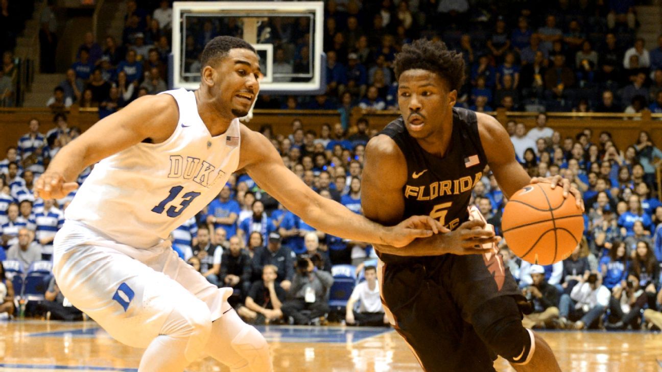 Luke Kennard, Jayson Tatum and Matt Jones of the Duke Blue Devils