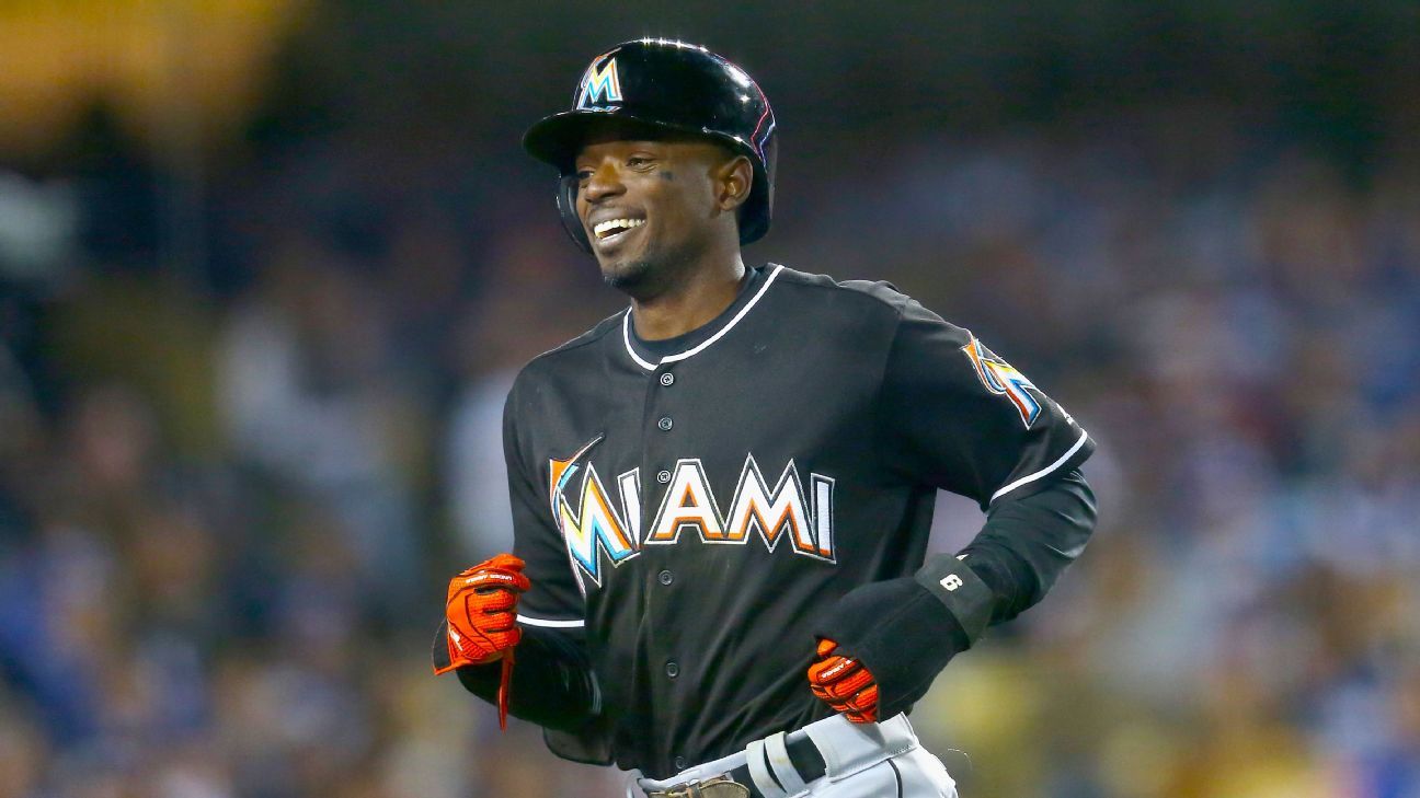 Miami Marlins second baseman Dee Gordon and shortstop Adeiny Hechavarria  congratulate each other after the Marlins defeated the Los Angeles Dodgers  5-3 in a baseball game, Thursday, April 28, 2016, in Los