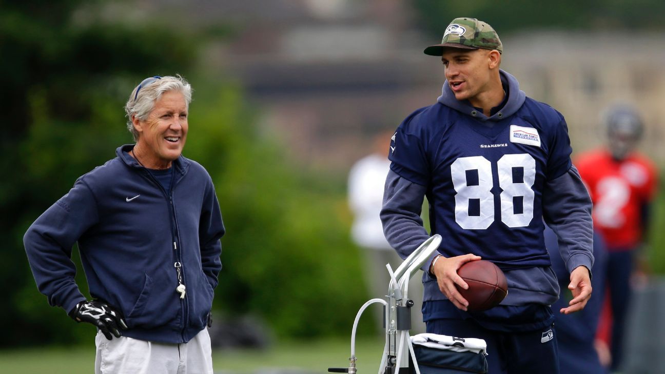 Jimmy Graham of the Seattle Seahawks watches from the sideline