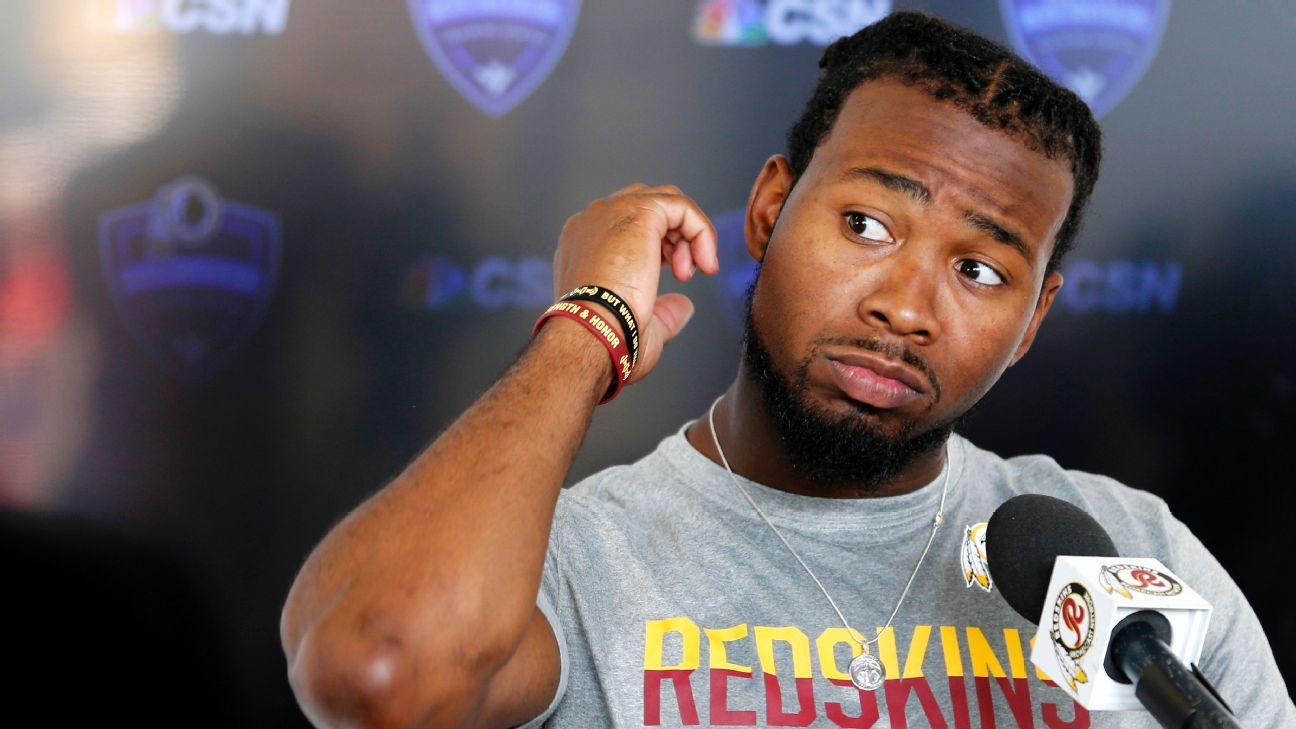 Washington Redskins' newly signed cornerback Josh Norman listens