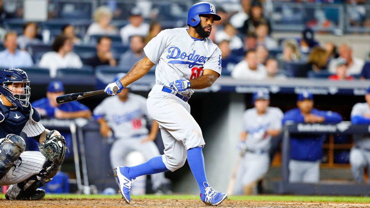 Los Angeles Dodgers' Andrew Toles runs to first during the second