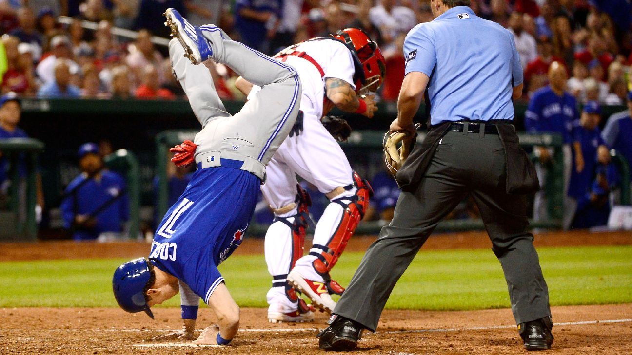 VIDEO: Blue Jays' Chris Coghlan flips over Yadier Molina during