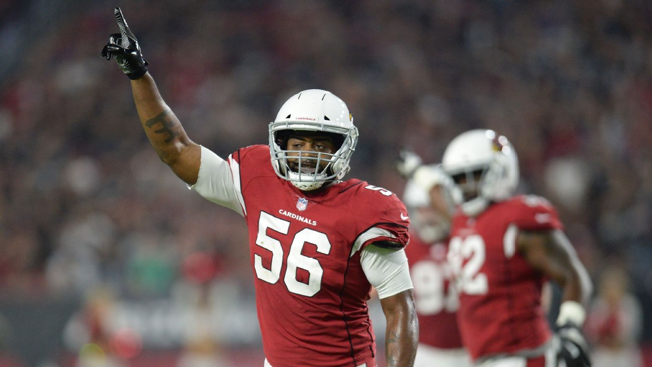 Arizona Cardinals linebacker Karlos Dansby (58) recovers a fumble