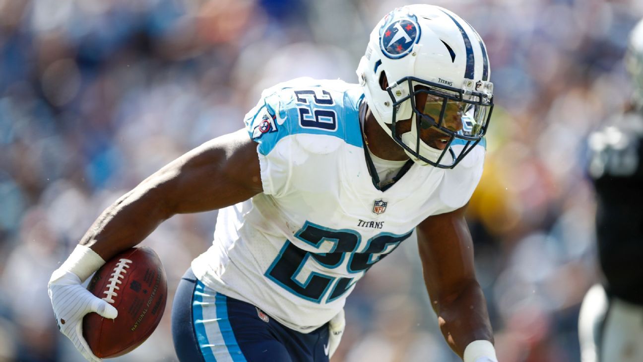 Titans unveil new uniforms, change helmet for first time in nearly 20 years  