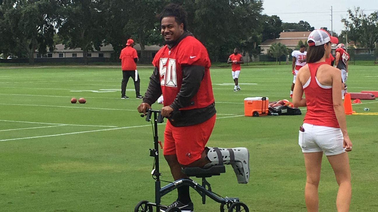 Funny video shows Vita Vea struggling with his postgame jersey