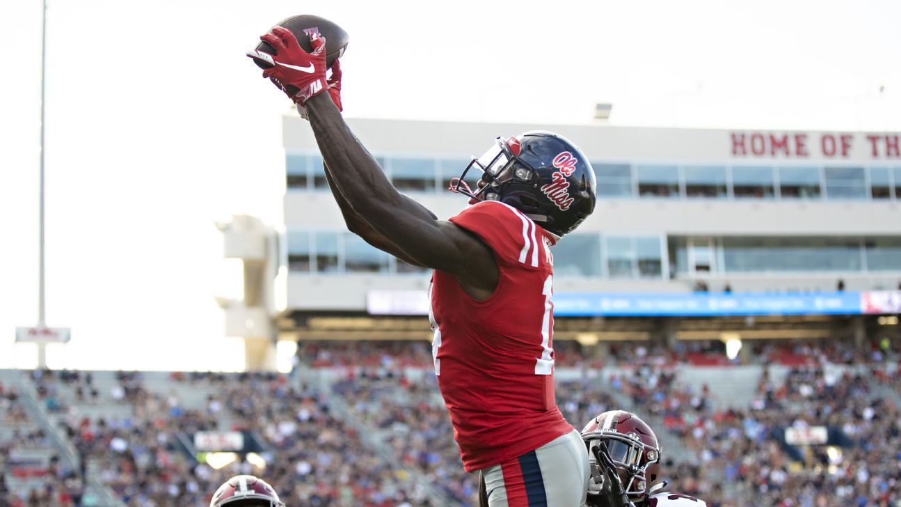 DK Metcalf Ole Miss Rebels Unsigned White Jersey Running Photograph