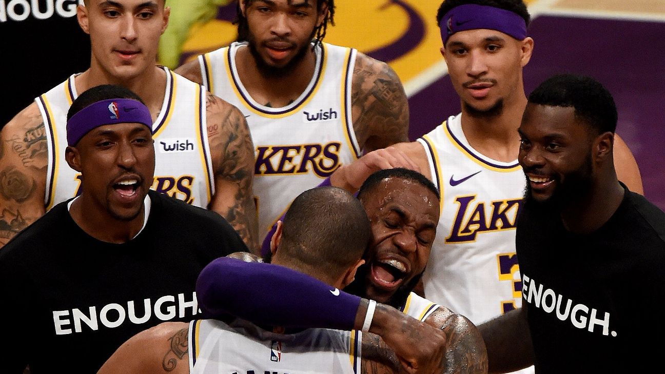 Los Angeles Lakers' Tarik Black, left, and D'Angelo Russell plays