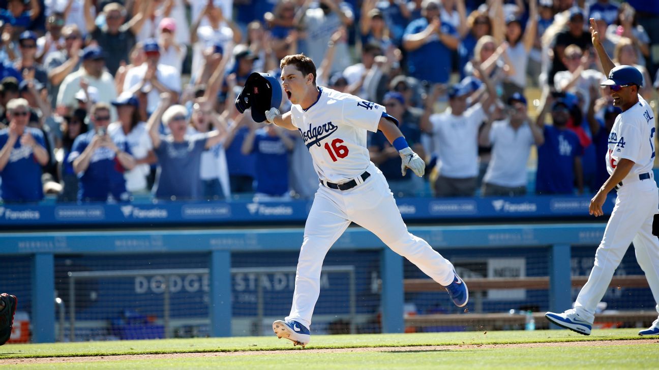 Los Angeles Dodgers' celebrate in the ninth inning after Will Smith hit a  solo home run to give the Dodgers their second walk-off win in four days  with a 4-3 victory over