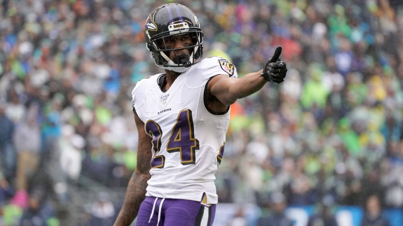 Baltimore Ravens cornerback Marcus Peters (24) looks on during pre-game  warm-ups before an NFL football game against the Carolina Panthers, Sunday,  Nov. 20, 2022, in Baltimore. (AP Photo/Terrance Williams Stock Photo 