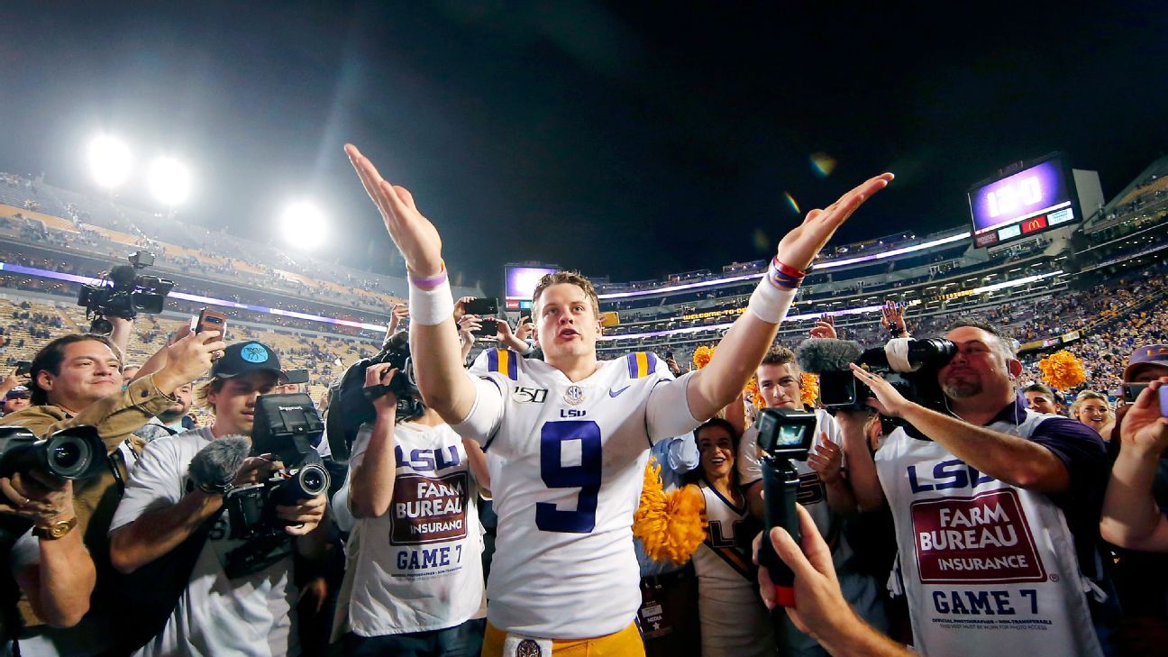 LSU quarterback Joe Burrow (9) celebrates after connecting with wide  receiver Justin Jefferson for a touchdown against Texas during the second  half of an NCAA college football game Saturday, Sept. 7, 2019