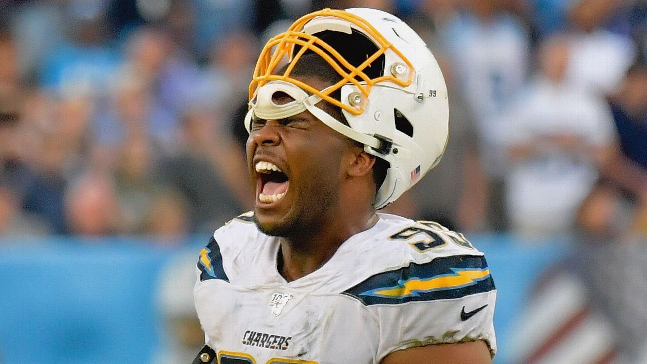 Jerry Tillery and Joey Bosa of the Los Angeles Chargers celebrate