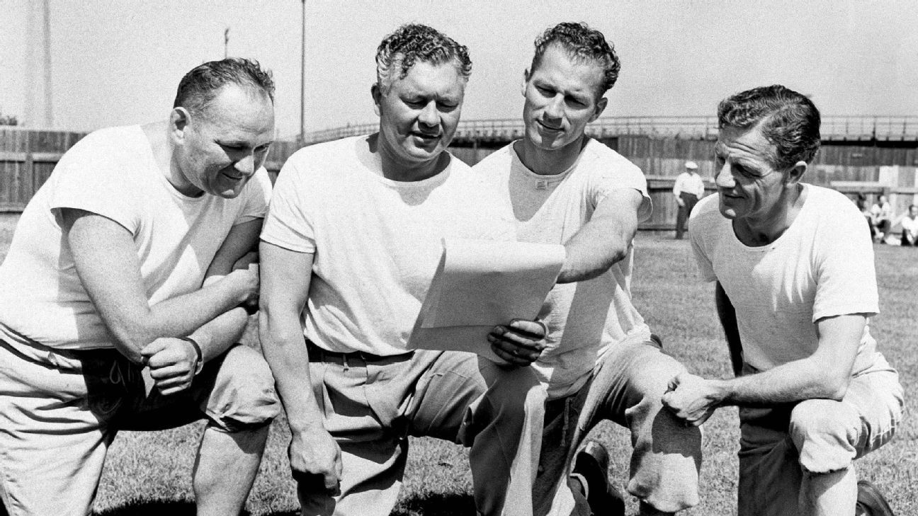 Coach Earl Curly Lambeau, right, just named coach of the Chicago