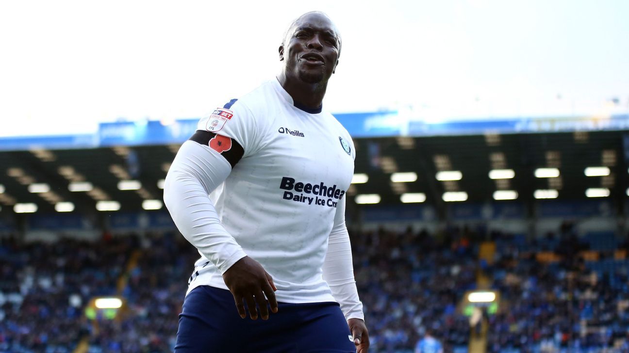 Última Divisão on X: Akinfenwa, o jogador mais forte do mundo, ia se  aposentar hoje. Mas o time dele, Wycombe, se classificou para os playoffs  da 3ª divisão inglesa. Então ele terá