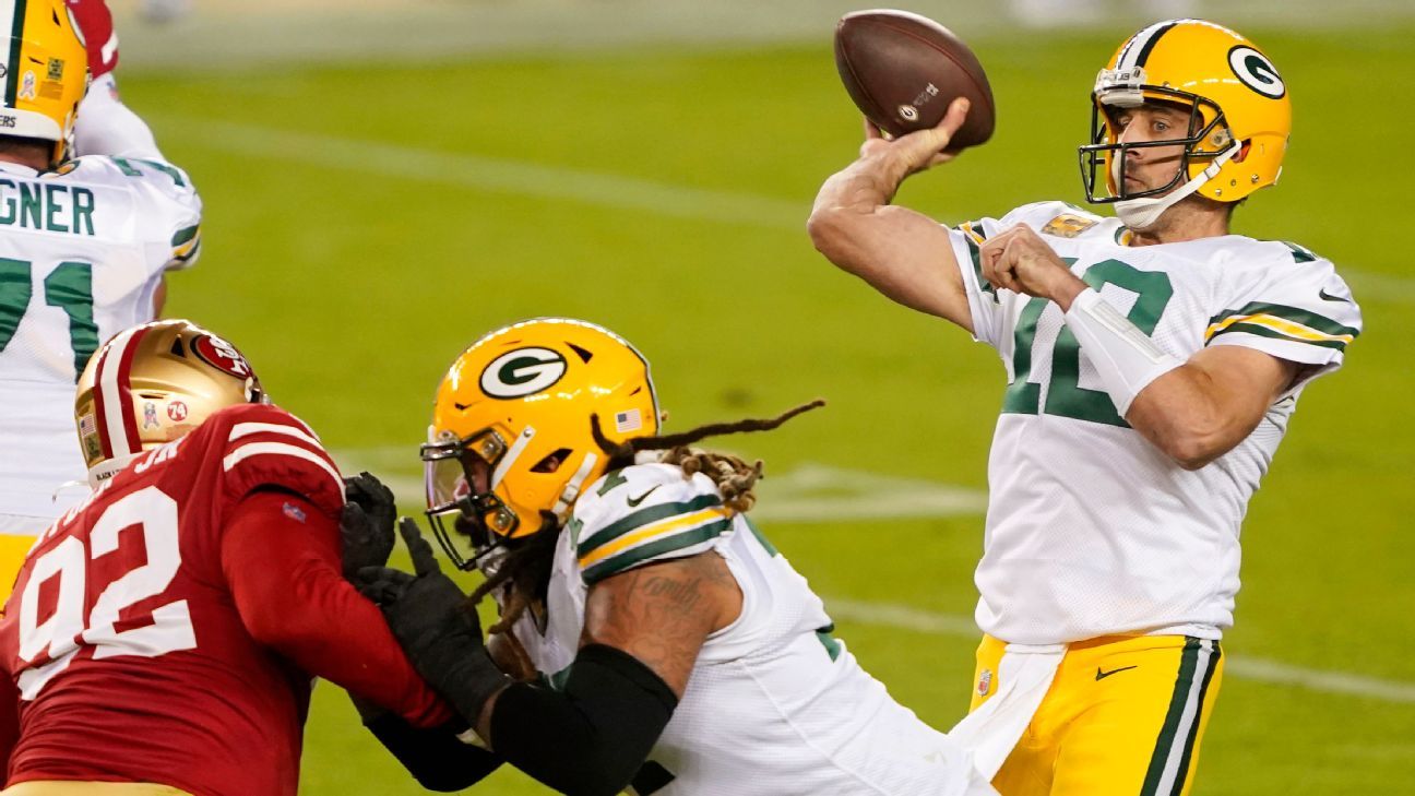 Packers' Aaron Rodgers throws three TDs in first half, including perfect toss to Davante Adams